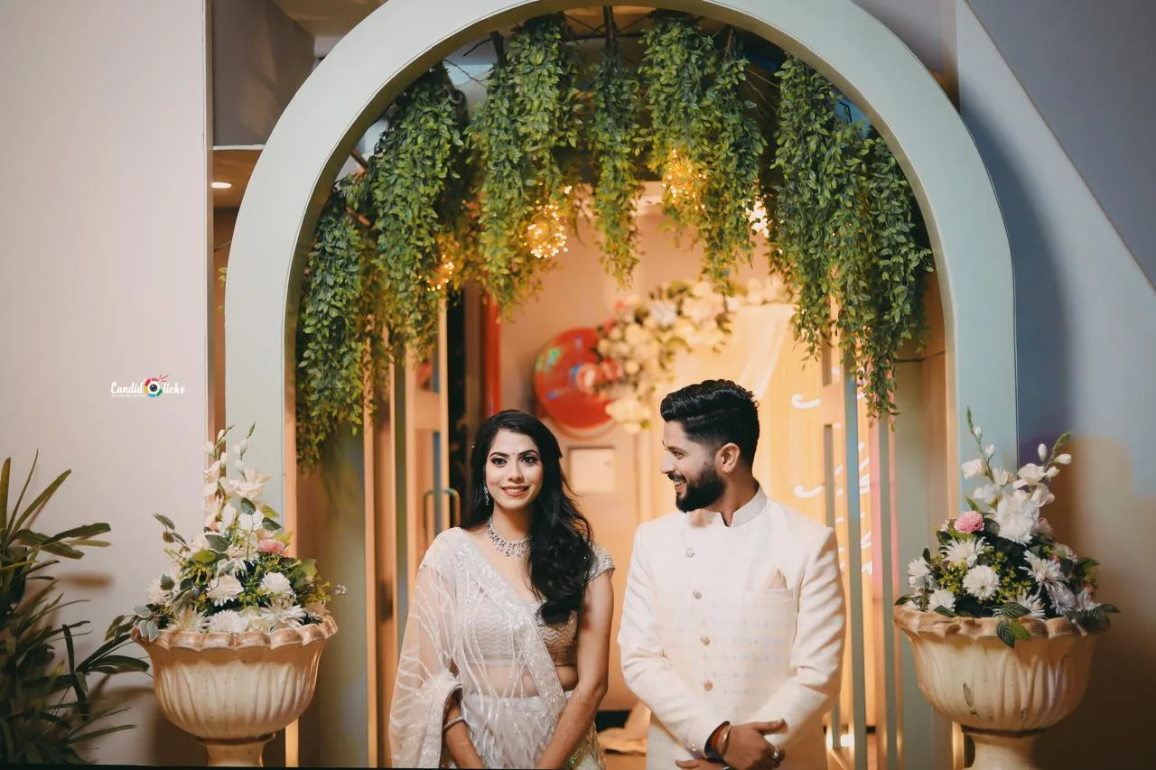 Engagement couple photographed by Candid Clicks